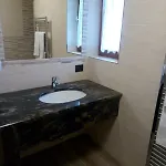 Cusini Saroch Λιβίνιο